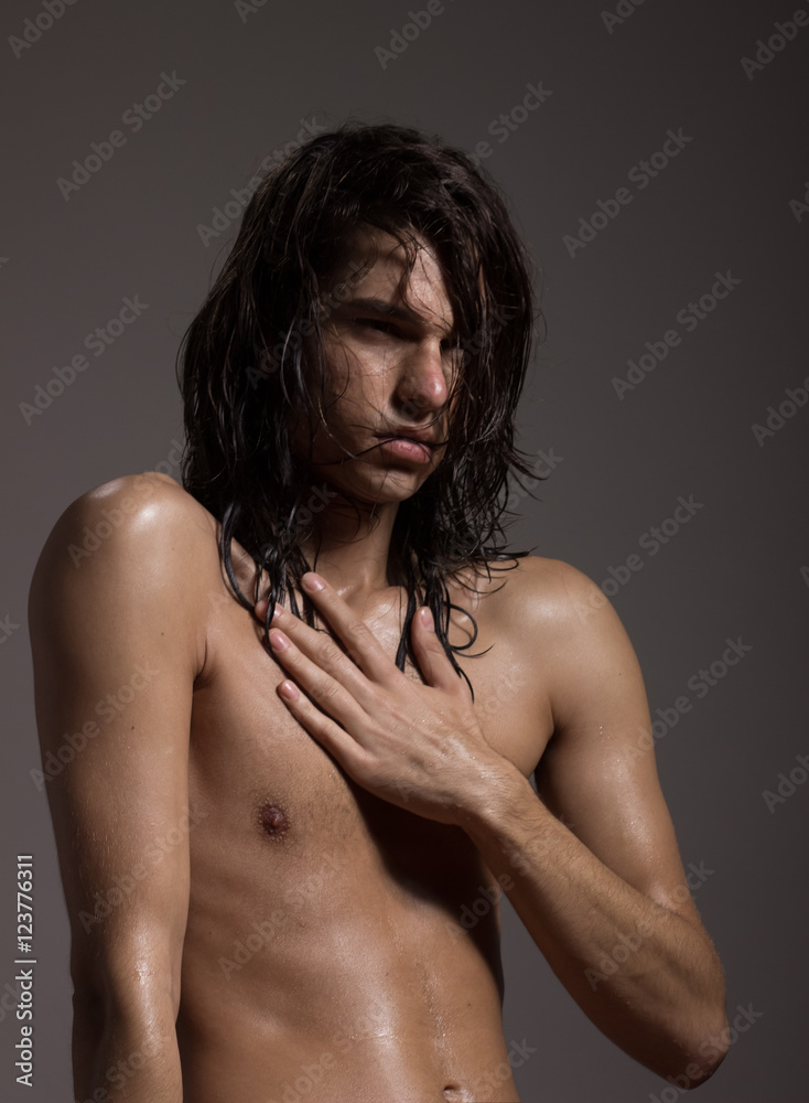 Fashion photography nude body young man model wet long hair Stock Photo |  Adobe Stock