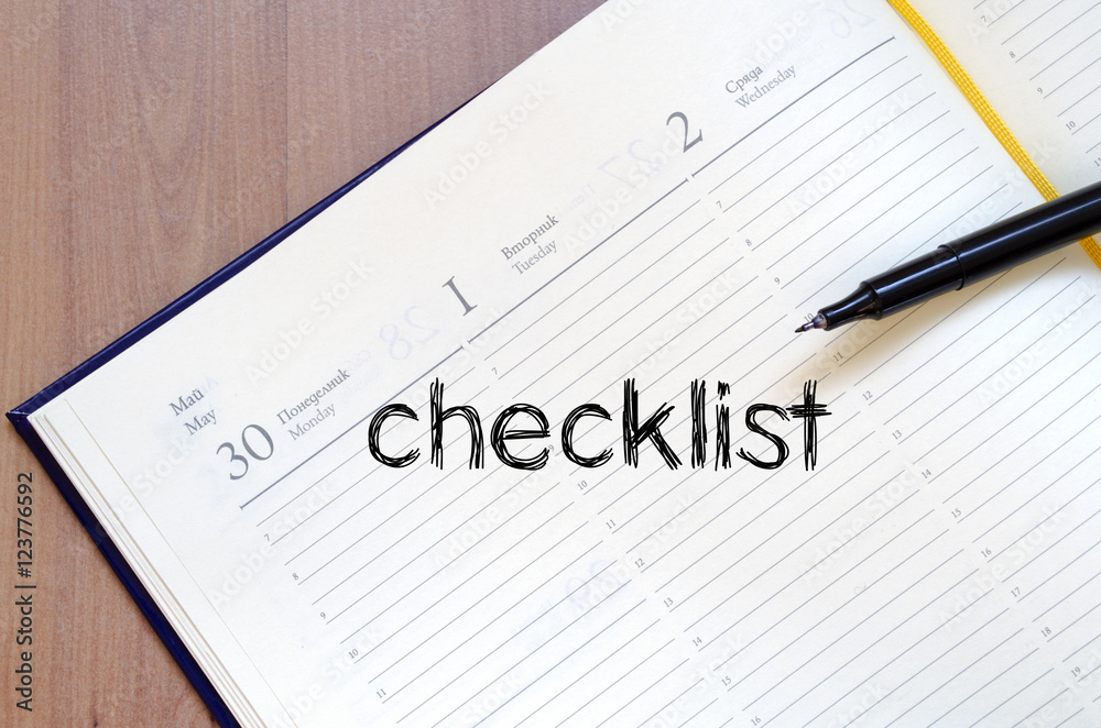 Checklist text concept on notebook Checklist text concept on notebook