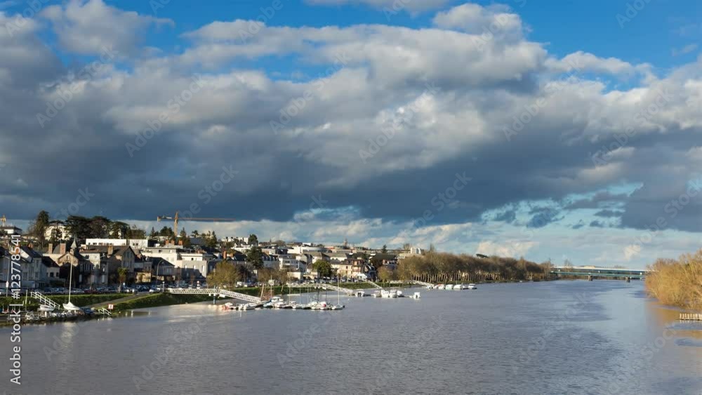 La Maine River in Angers, France with Rainbow and Clouds Day Timelapse La Maine River in Angers, France with Rainbow and Clouds Day Timelapse
