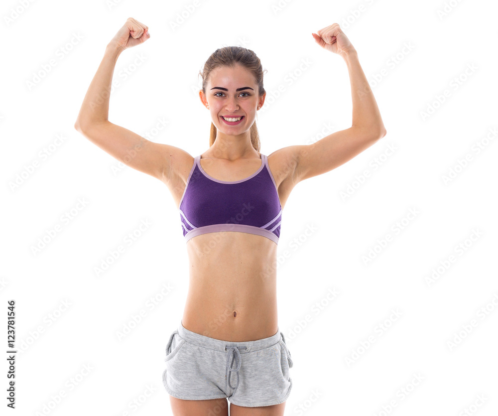 Athletic woman showing her biceps Athletic woman showing her biceps