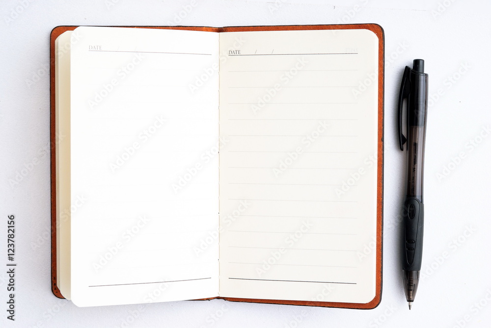 notepad with pen isolated notepad with pen isolated