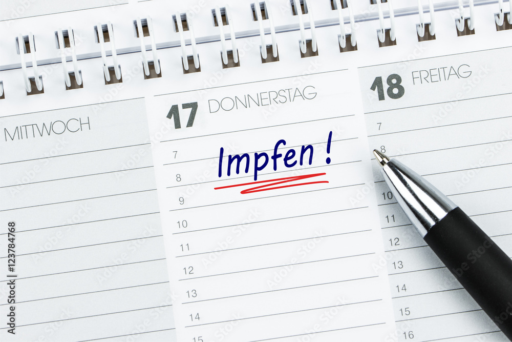 Impfen Termin rot unterstrichen im Kalender Impfen Termin rot unterstrichen im Kalender
