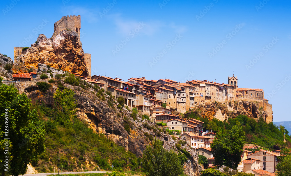 Day view of houses on rocks in Frias. Burgos