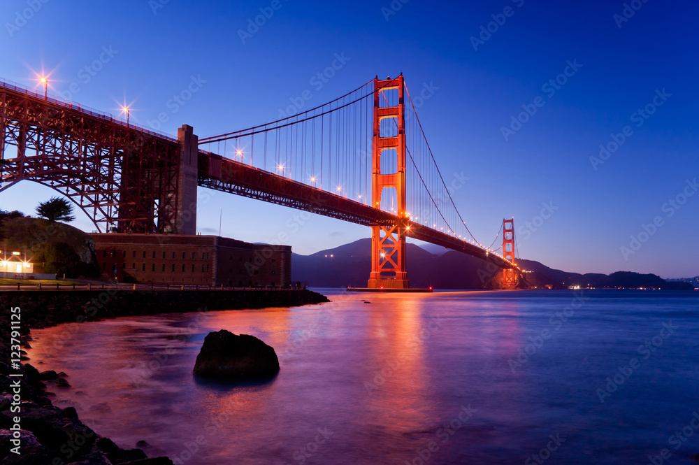 Twilight Golden gate bridge in elevation angle from bay in San Francisco California USA