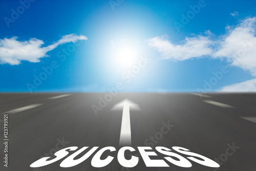 Empty blur asphalt road under blue sky and sign which symbol suc photo