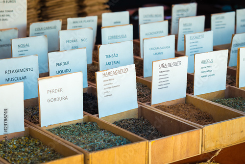 Selection of spices on a traditional market photo