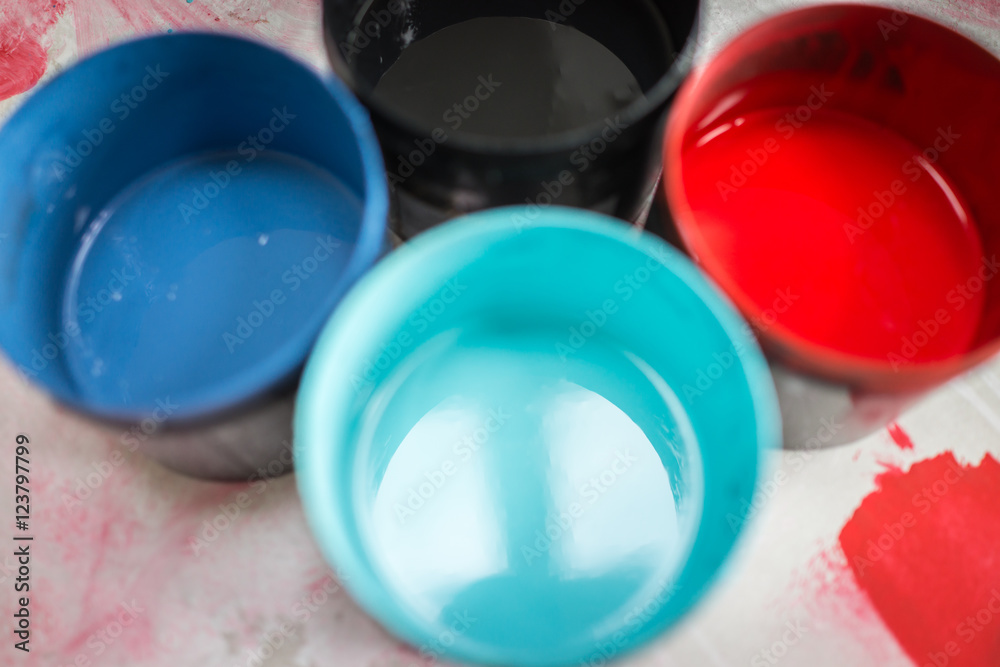 Metal buckets with colorful paint on Metal buckets with colorful paint on