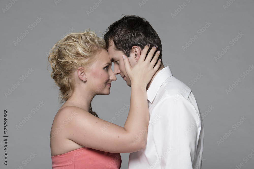 Young couple portrait in studio Young couple portrait in studio