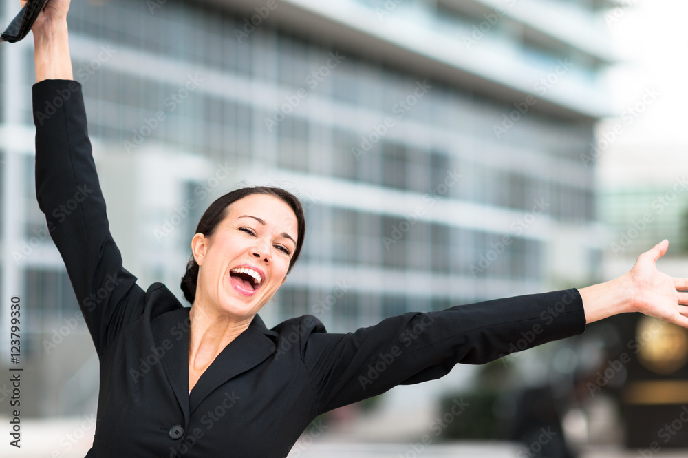 Happy businesswoman with arms outstretched Happy businesswoman with arms outstretched