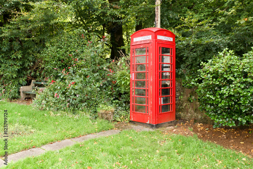 Typical british phone box in the picturesque village Altarnun in Cornwall. Typical british phone box in the picturesque village Altarnun in Cornwall.