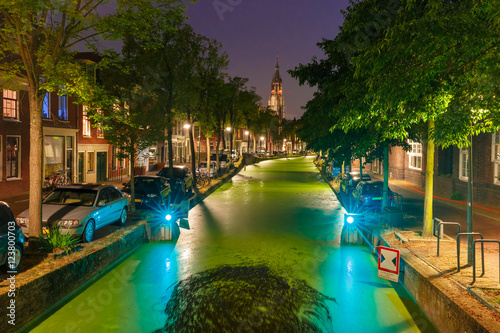 Night Oosteinde canal and Gothic Protestant Nieuwe Kerk  New church in Delft  Holland  Netherlands