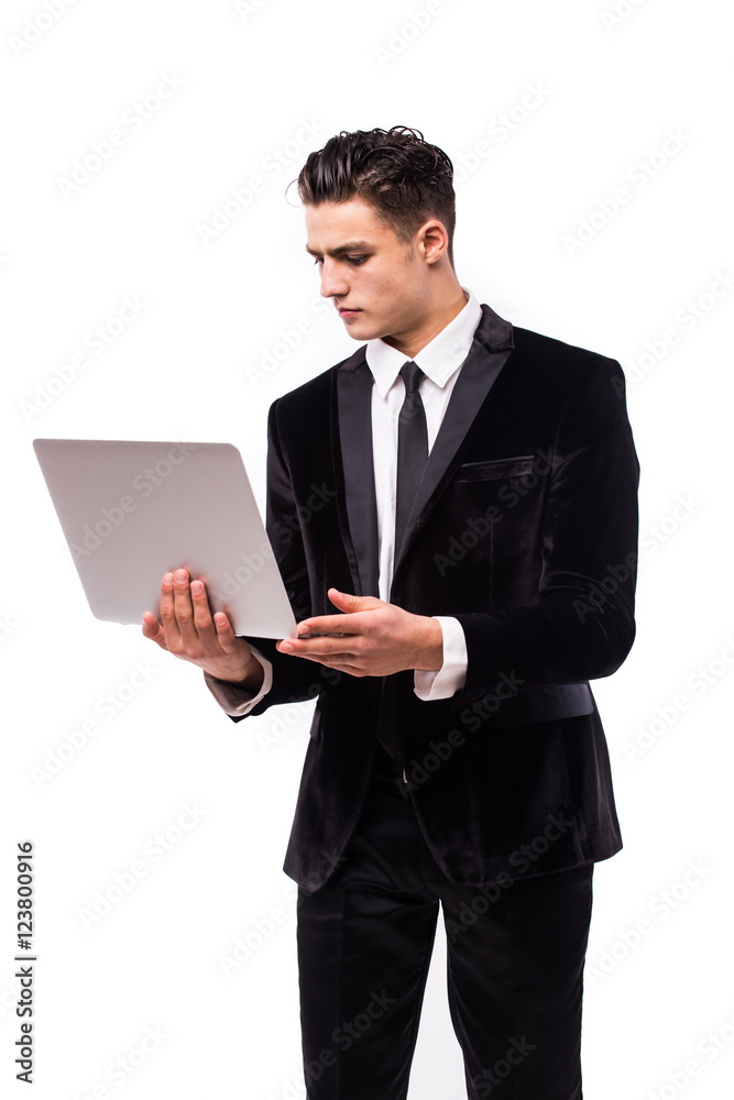 Portrait of smiling young businessman with laptop isolated over white background. Portrait of smiling young businessman with laptop isolated over white background.