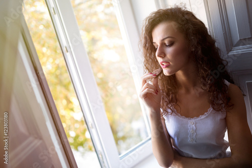 Beautiful brunette eating cookies Free Download Beautiful brunette eating cookies - GFXLoad
