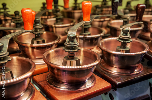 row of coffee grinders