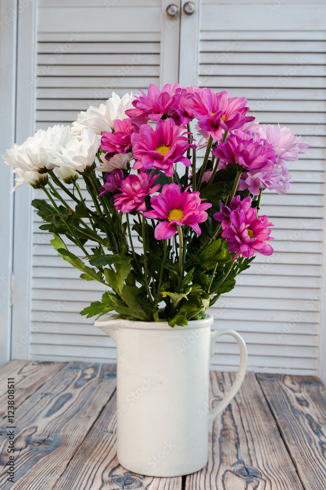 beautiful chrysanthemum in a vase in the style of Provence beautiful chrysanthemum in a vase in the style of Provence