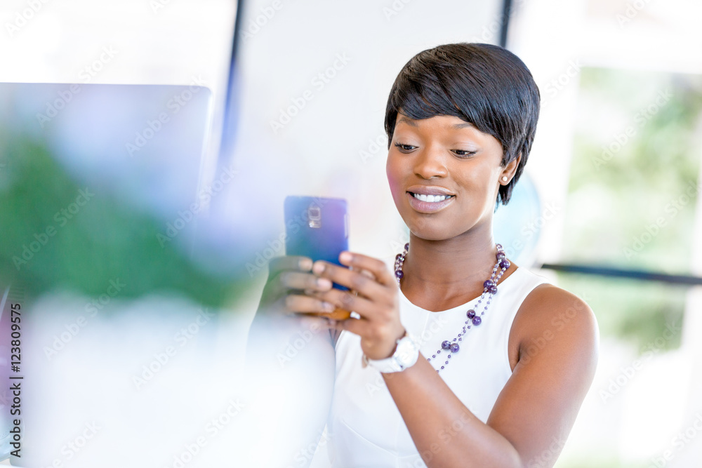 Portrait of smiling business woman with mobile Portrait of smiling business woman with mobile