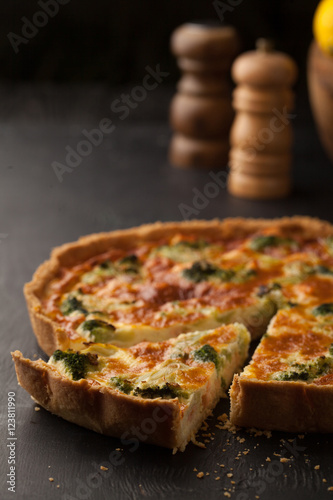 Delicious quiche with broccoli and salmon photo