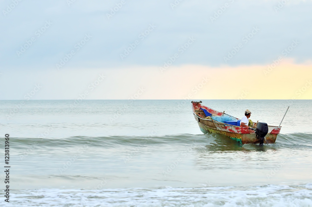 Fishermen ready to go to the sea at the morning.