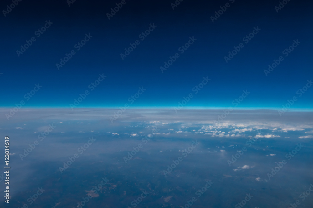 Fototapeta premium The high altitude view on the background of cloud stream. Wide angle