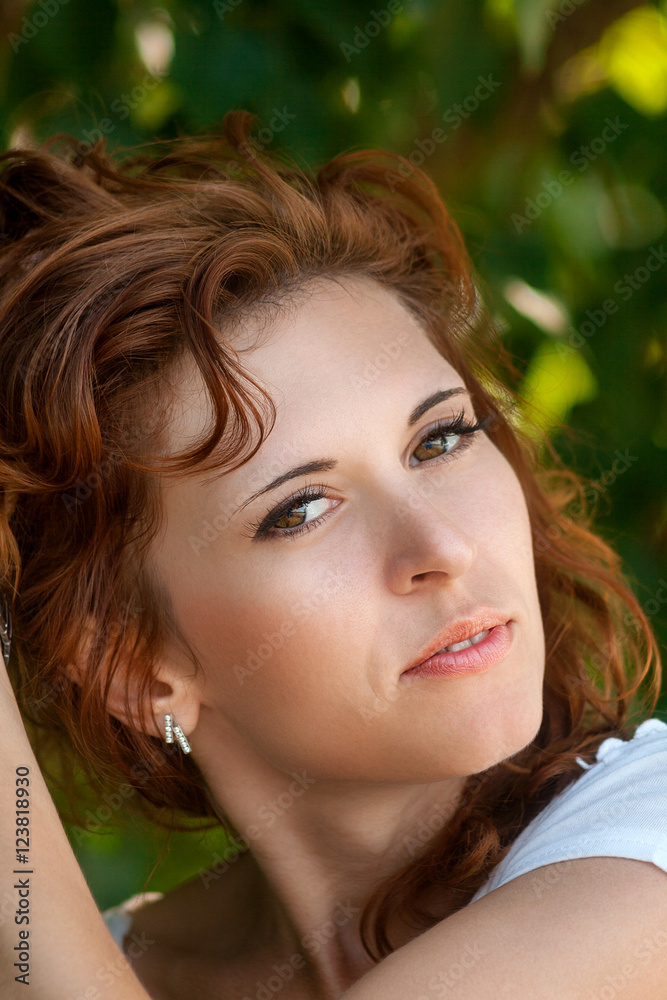 Beauty portrait of young beautiful smiling girl holding hair, fashion, close-up. Beauty portrait of young beautiful smiling girl holding hair, fashion, close-up.
