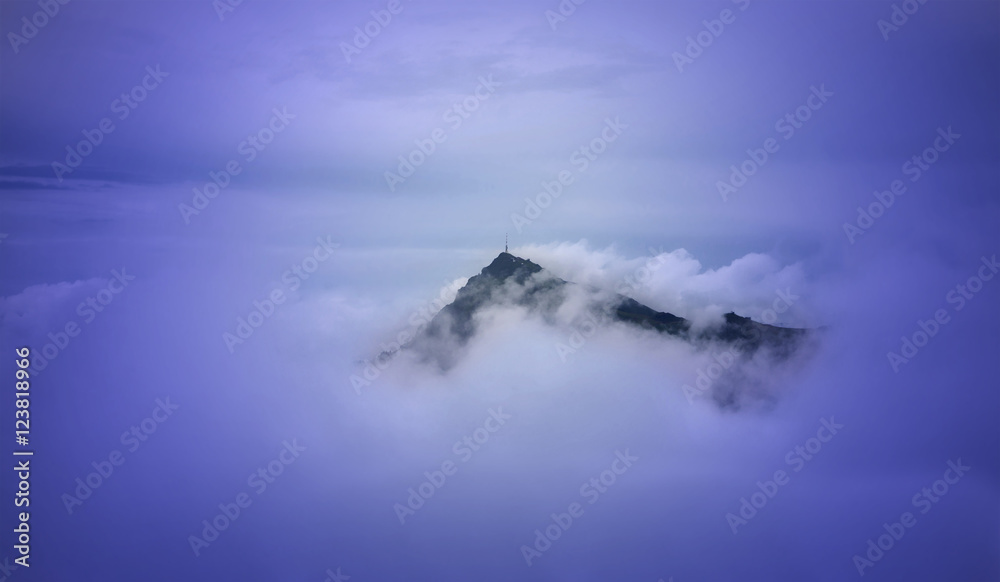 Beautiful landscape with Kitzbuhel mountain peak in the mist, Tirol, Austria