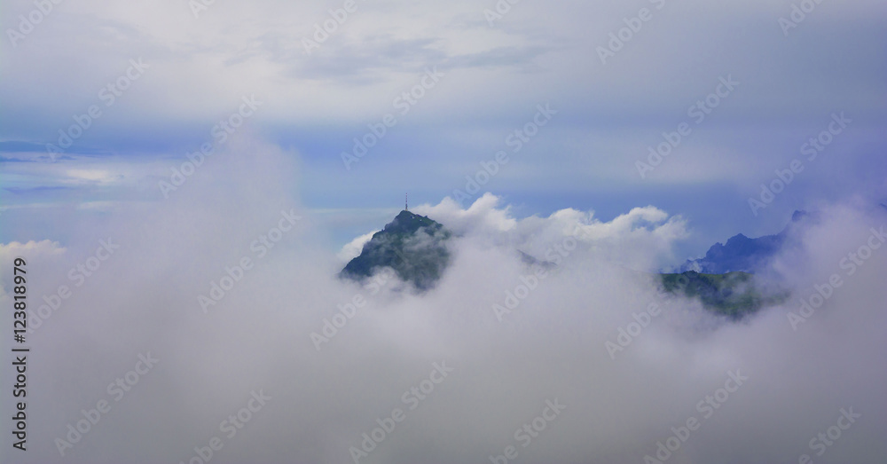 Obraz premium Beautiful landscape with Kitzbuhel mountain peak in the mist, Tirol, Austria