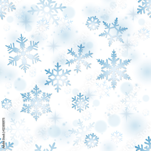 Seamless winter background with snowflakes