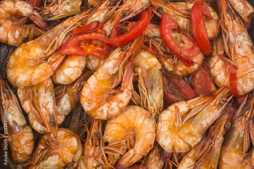 Cooked Fresh Shrimp with Tomato and Onions / Cooked Fresh Shrimp with Tomato and Onions Served in a plate on a Wooden ( Black Ceramic) background