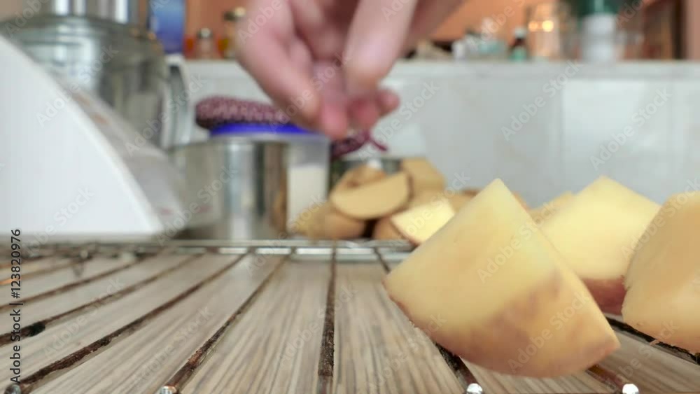 Raw potato slices on the grill / Laying the potato slices on the grill, time lapse
Raw potato slices on the grill / Laying the potato slices on the grill, time lapse