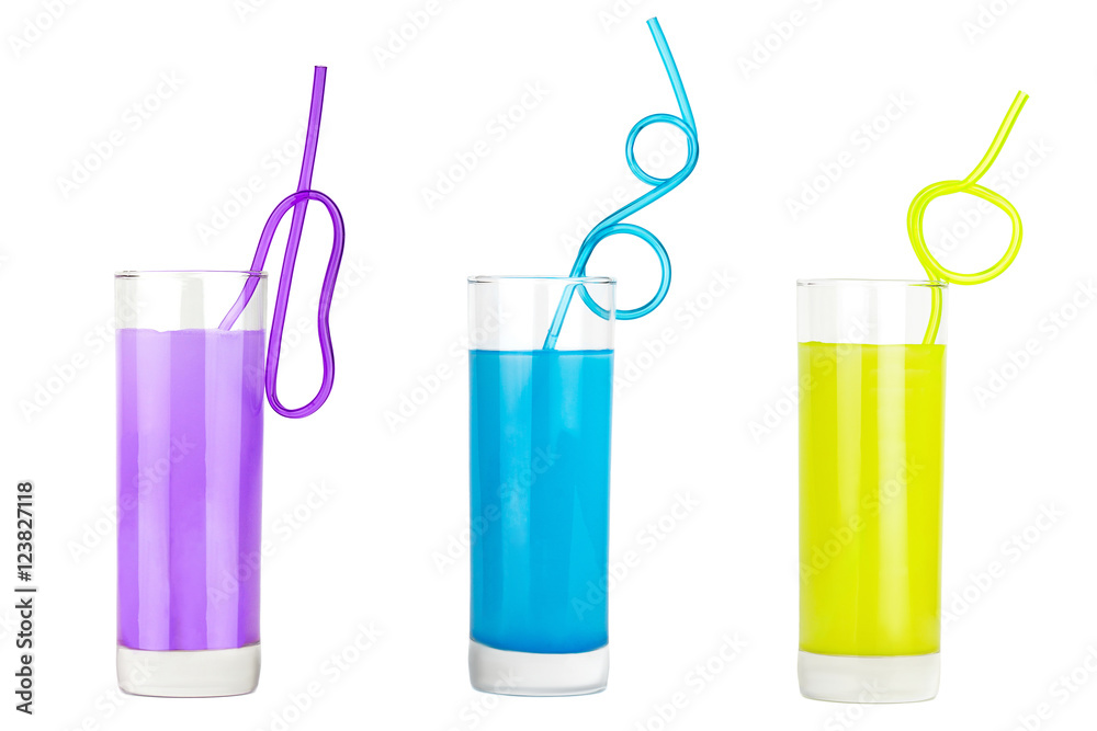 Colorful set of glasses with juice and straw Colorful set of glasses with juice and straw