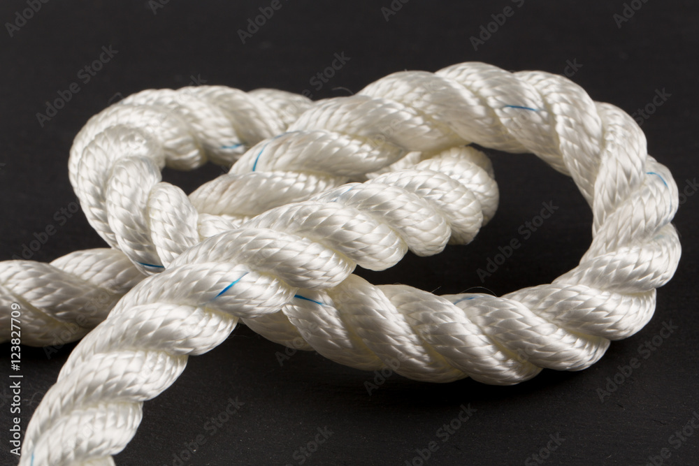 knot of rope on dark knot of rope on dark