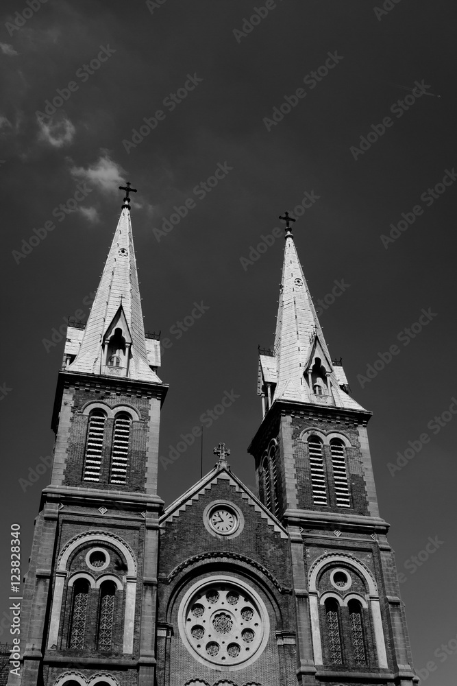 Saigon Notre Dame Cathedral Basilica in Ho Chi Minh city, Vietnam. Asia. Shoot in black and white shot with morning light and beautiful clear sky.