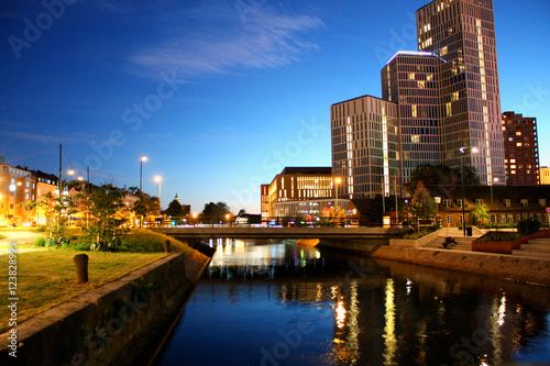 Malmo city urban landscape with water canal and city buildings in Sweden.