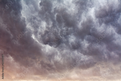 Stormy sunset clouds background