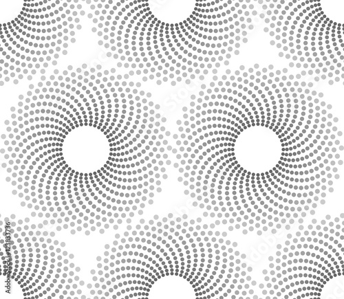 Vector seamless texture. Modern geometric background. Repeating pattern with circles filled with dots of different sizes.