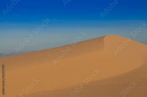 mountain of windy white sand dunes, Muine desert, Phan Thiet, Vietnam © akeeris