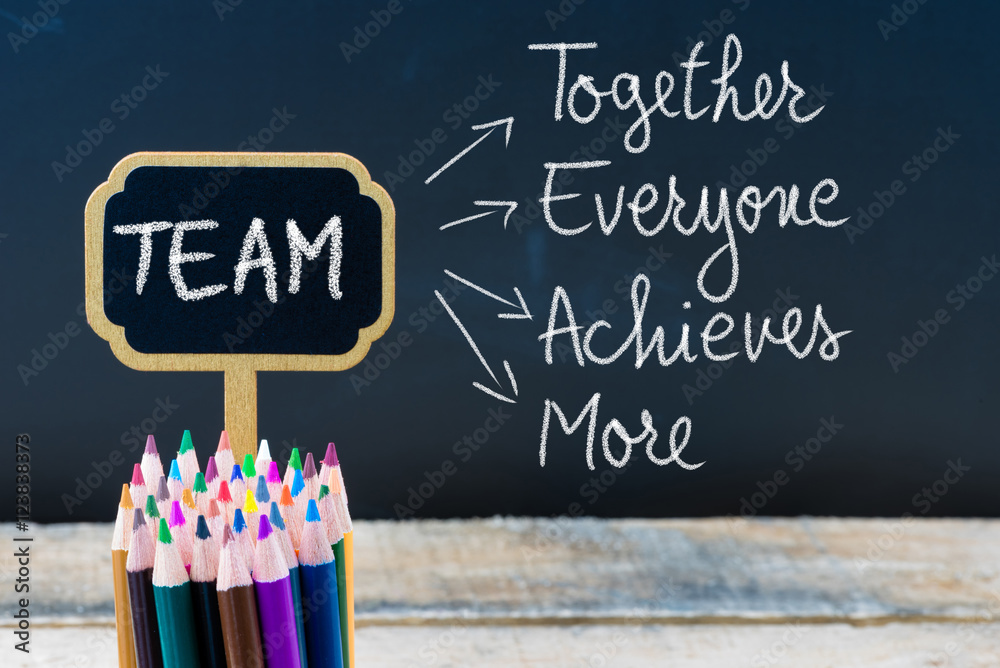 Φωτογραφία Business Acronym TEAM Together Everyone Achieves More written with chalk on wood