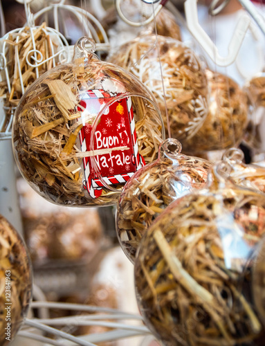 Christmas balls made of glass and full of straw