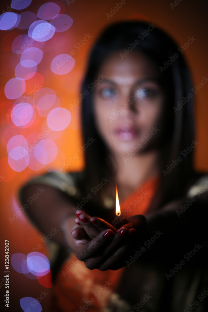 indian woman holding oil lamp for diwali festival Stock Photo Adobe Stock