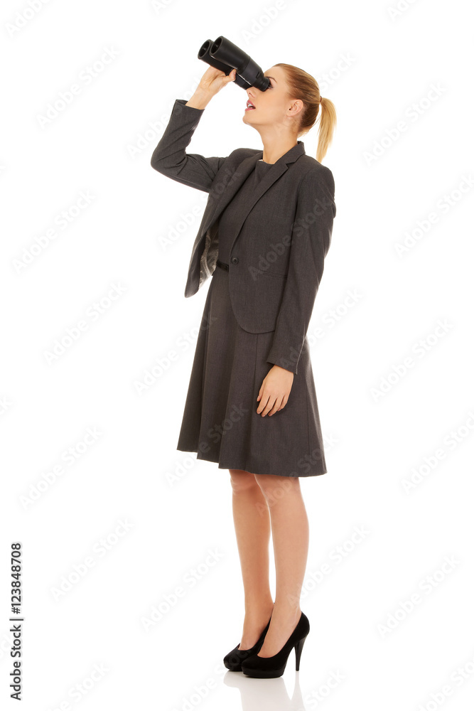 Young business woman with a binocular Young business woman with a binocular