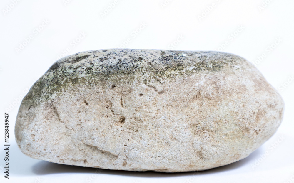 Single natural stone on white background Single natural stone on white background