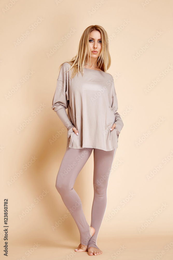 Beautiful attractive sexy blond woman doing yoga sitting in Beautiful attractive sexy blond woman doing yoga sitting in