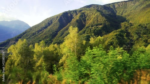 View of a mountain landscape from a runaway train photo