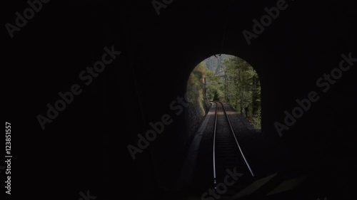 View of a mountain landscape from the cockpit of a train