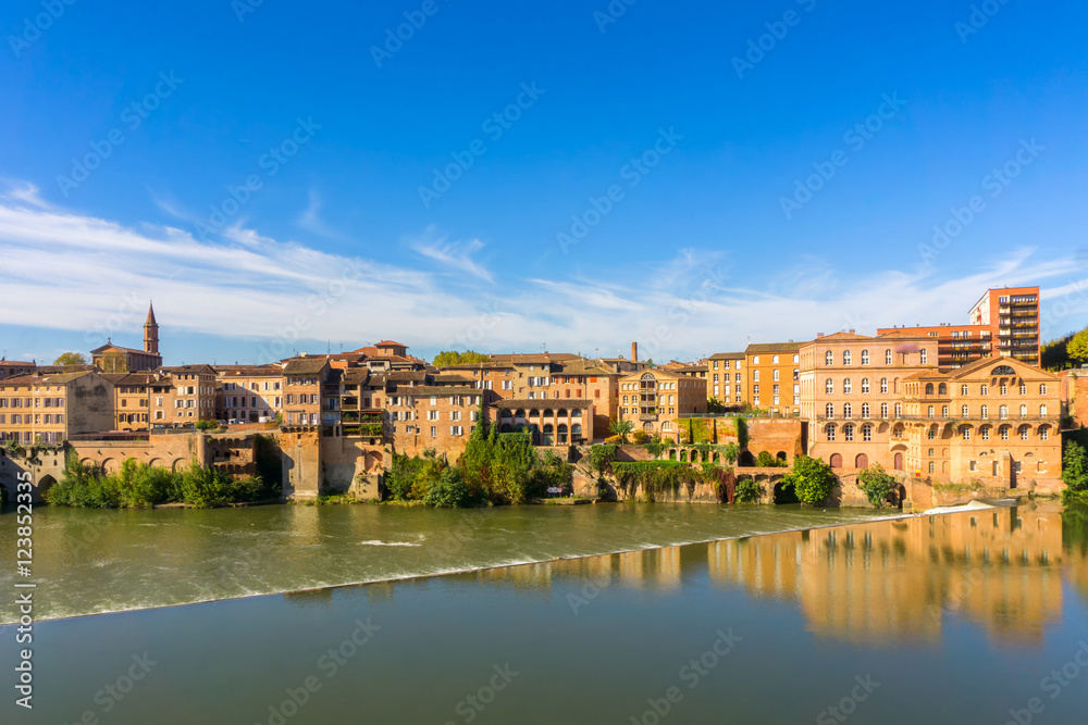 Naklejka premium Albi in Southwestern France. Albi is a world heritage UNESCO site. View of the Tarn River and the Cathedral Saint Cecile.