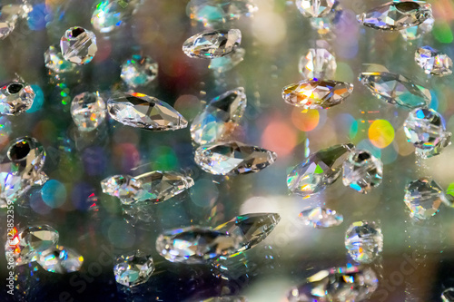 Large crystal strasses on a blur colored background. low depth of field. photo