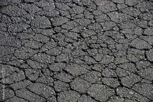 cracked asphalt road surface background