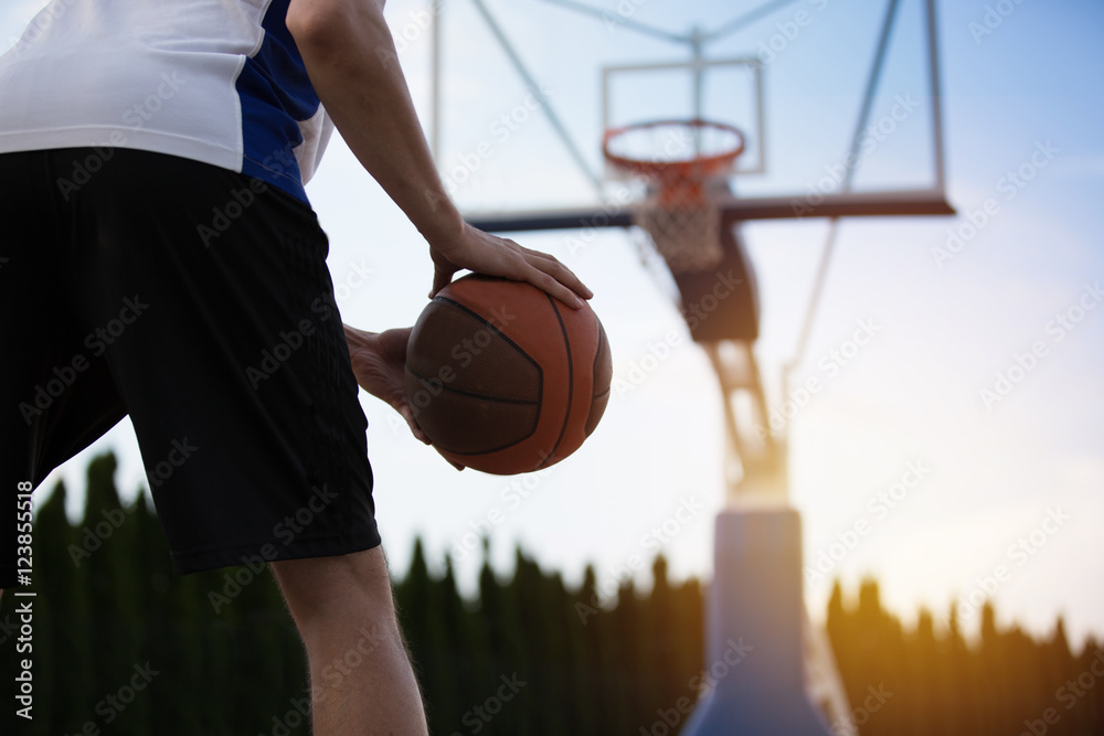 Fototapeta premium Basketball player training on the court. concept about basketbal