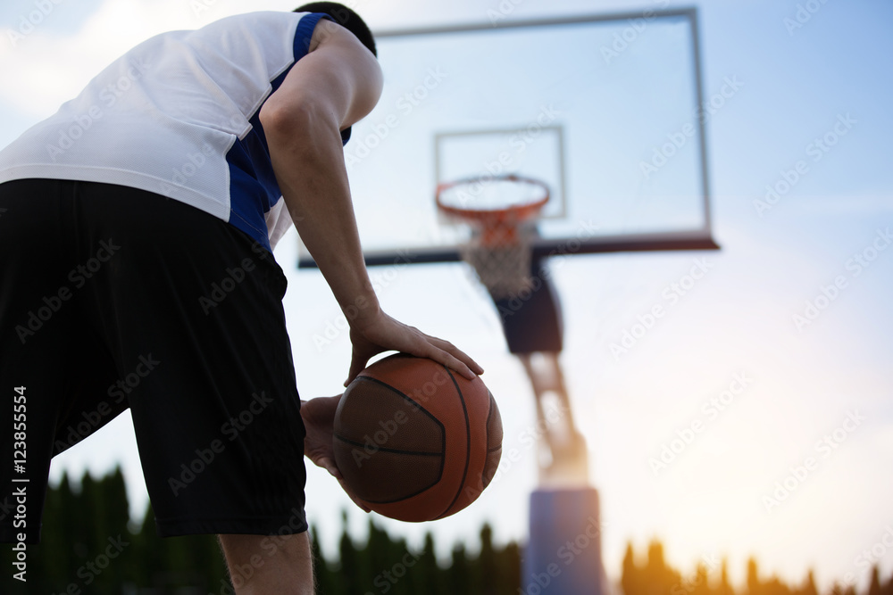 Fototapeta premium Basketball player training on the court. concept about basketbal