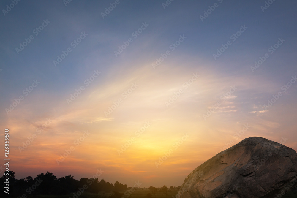 Obraz premium Beautiful sunset landscape with stone conceptual scene